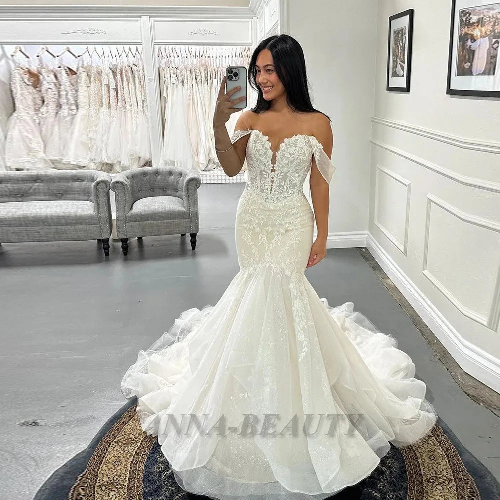 Anna Abiti da sposa eleganti con volant per Mariage Sirena Applicazioni in pizzo con spalle scoperte Vestido de Casamento Personalizzato