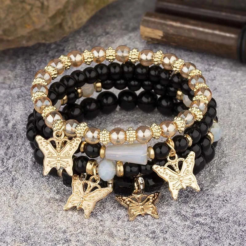 Set di braccialetti con perline a farfalla alla moda da 4 pezzi per le donne, perline acriliche rosa, braccialetto a catena elastica, regalo di gioielli per feste bohémien femminili
