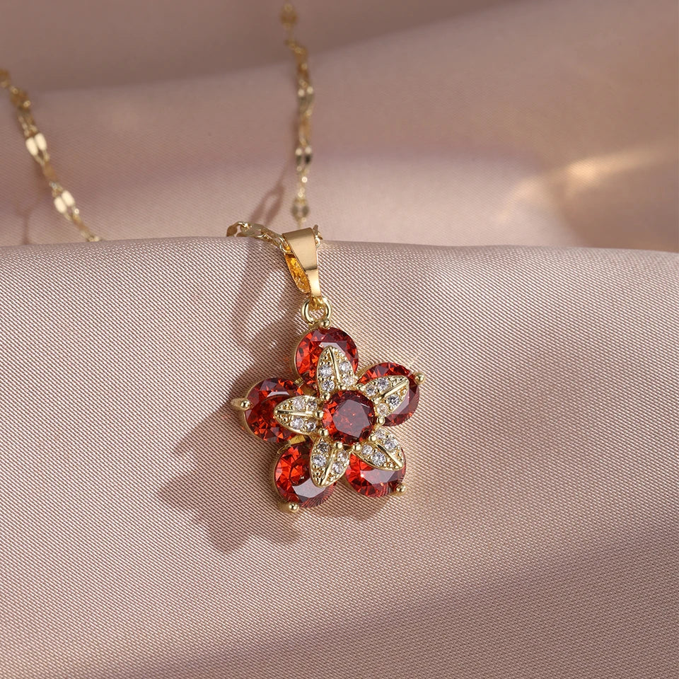 Collana con ciondolo fiore zircone rotante di lusso leggero per le donne Collane a catena ad alto senso di qualità color oro Regali di gioielli per feste