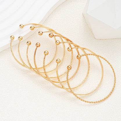 7 pezzi/set braccialetti color oro punk per donna streetwear stampe a cuore gotico design in metallo braccialetto aperto regali di gioielli di moda