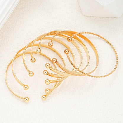 7 pezzi/set braccialetti color oro punk per donna streetwear stampe a cuore gotico design in metallo braccialetto aperto regali di gioielli di moda