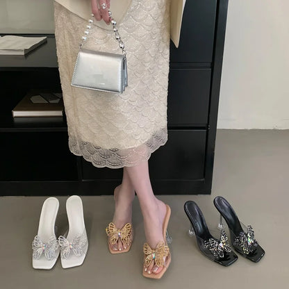 Pantoufles d'été à talons étranges pour femmes, strass papillon, bout carré, chaussures de soirée, sandales transparentes