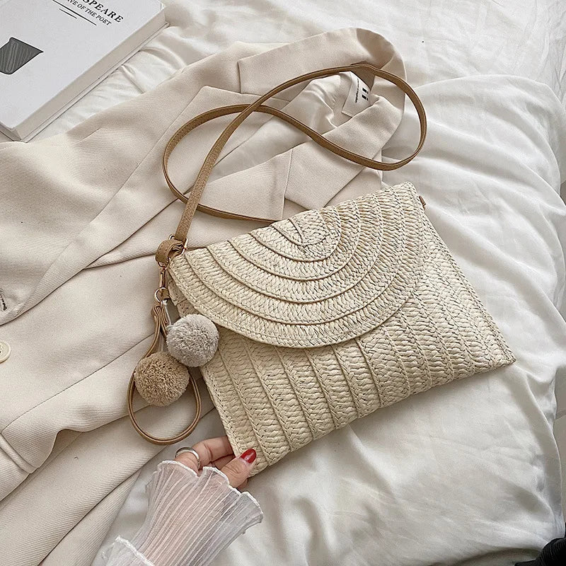 Pochette di paglia da spiaggia estiva borsa a tracolla con ciondolo a sfera carina per le donne borse a tracolla da viaggio borsa da donna borse Casual borsa di vimini