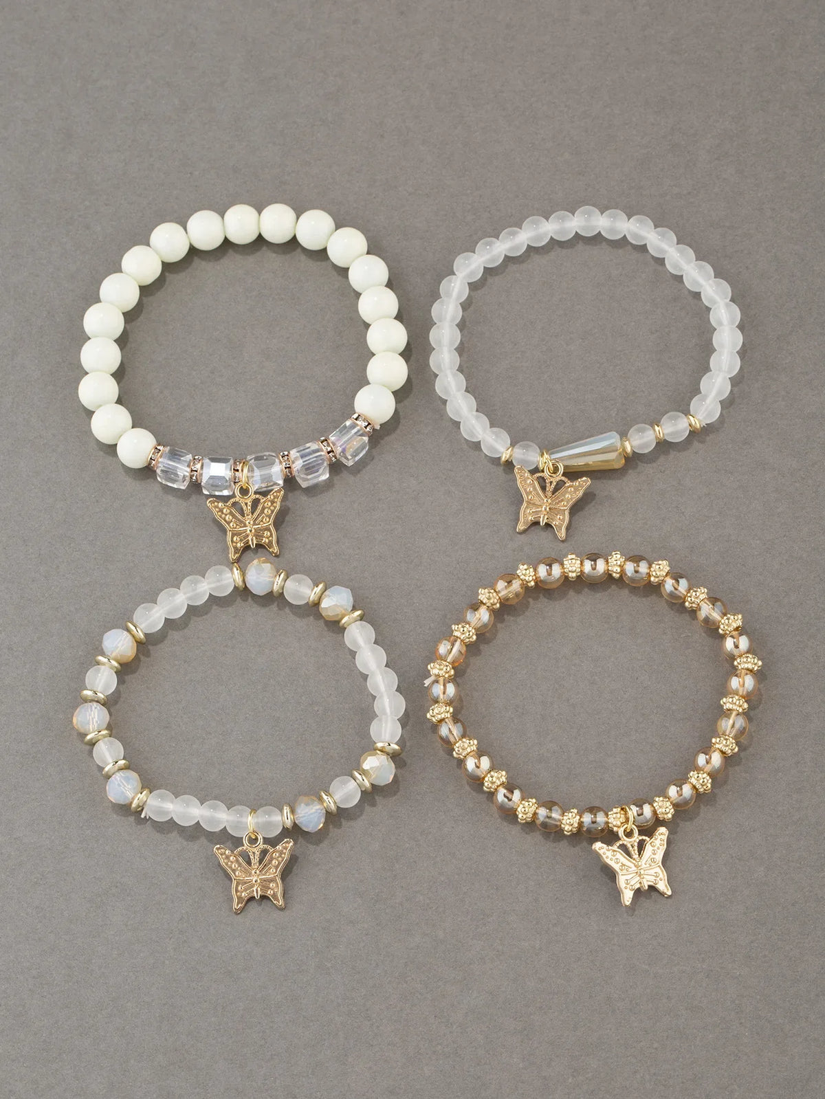 Set di braccialetti con perline a farfalla alla moda da 4 pezzi per le donne, perline acriliche rosa, braccialetto a catena elastica, regalo di gioielli per feste bohémien femminili
