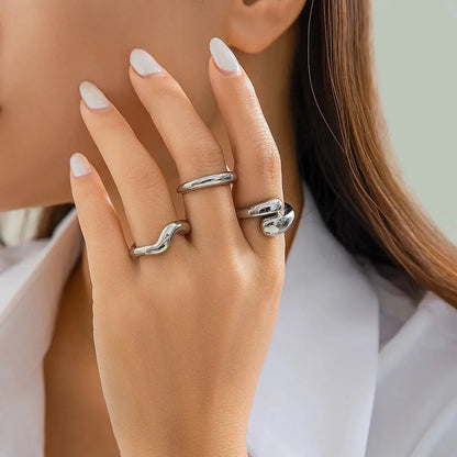 Set di anelli a forma di onda geometrica creativa alla moda da 3 pezzi per accessori per gioielli da dito con anello aperto regolabile irregolare di design da donna