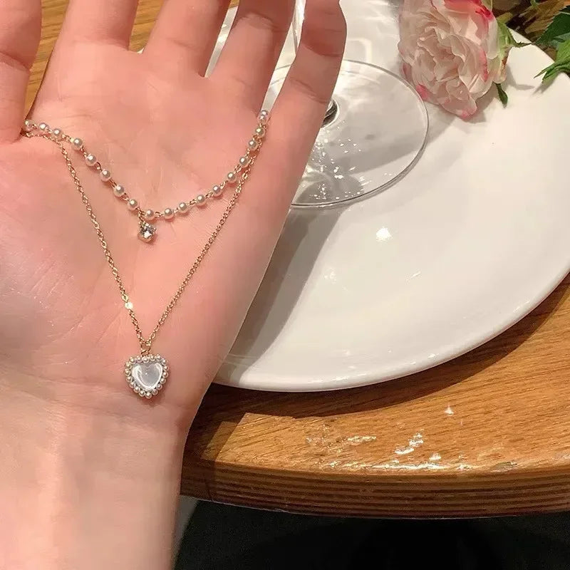 Collana di nuova moda semplice color argento con ciondolo a forma di cuore d'amore, collana con ciondoli a catena, per gioielli da festa da donna, da indossare ogni giorno
