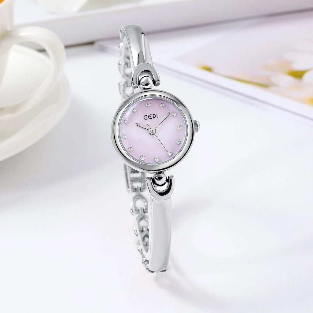 UTHAI W34 Orologio da polso da donna Luce di lusso Semplice squisito quadrante rotondo Orologio impermeabile Lady Fashion Orologi al quarzo coreani