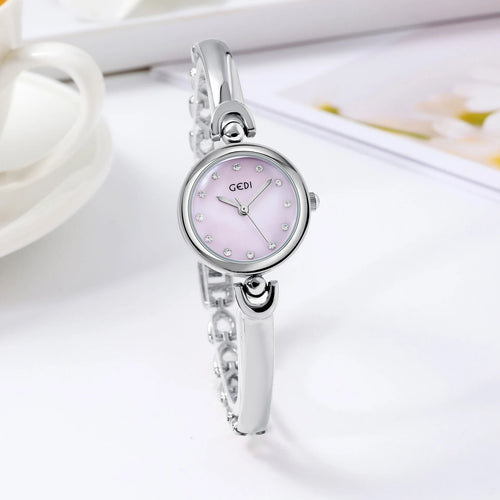 UTHAI W34 Orologio da polso da donna Luce di lusso Semplice squisito quadrante rotondo Orologio impermeabile Lady Fashion Orologi al quarzo coreani
