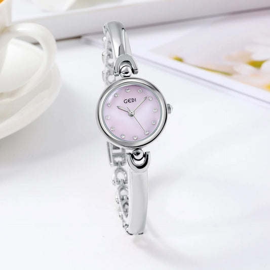 UTHAI W34 Orologio da polso da donna Luce di lusso Semplice squisito quadrante rotondo Orologio impermeabile Lady Fashion Orologi al quarzo coreani