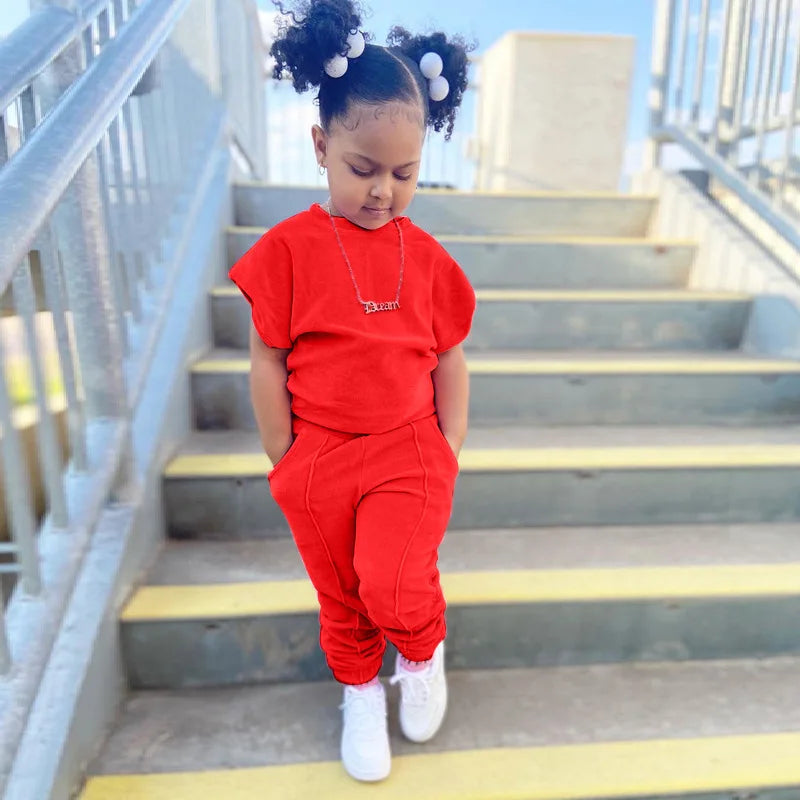 Moda Bambini Bambine Abbigliamento 2 pezzi Set T-shirt casual in cotone solido + Pantaloni in vita elastica Completi per bambini piccoli 1-6 anni