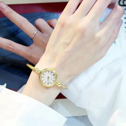 Orologio da polso da donna Orologio da donna con piccolo braccialetto in oro Orologio da polso da donna al quarzo retrò in acciaio inossidabile Orologio da polso