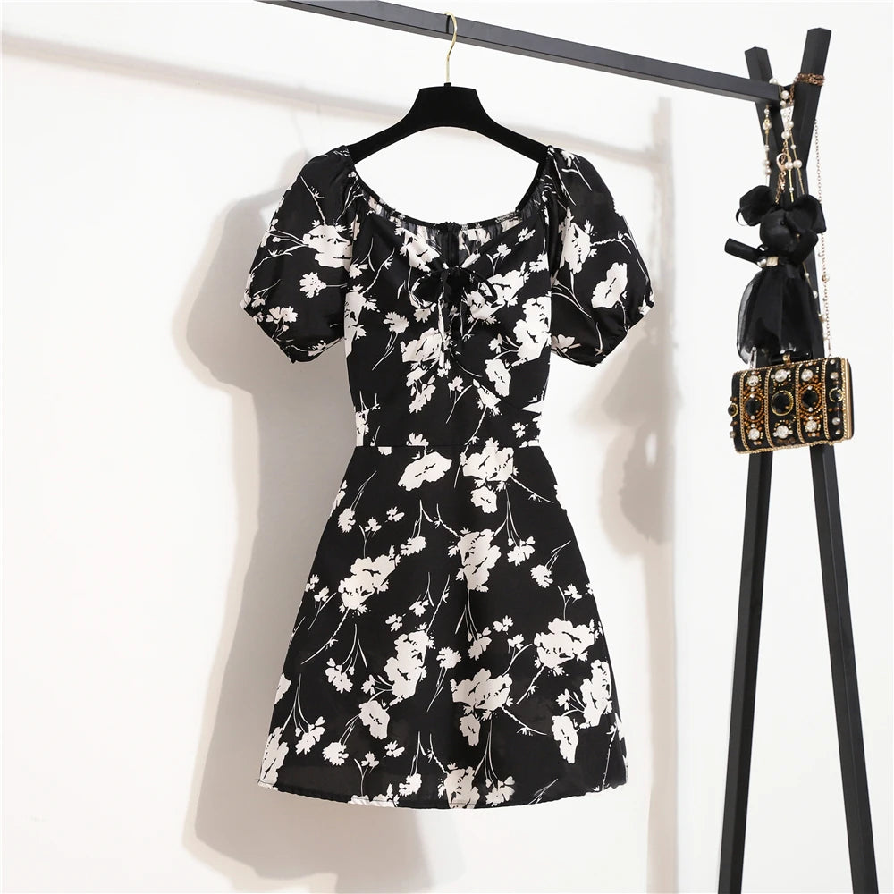 Mini abiti da donna Moda estiva Abiti femminili Stampa Abiti in chiffon floreale Abito casual con maniche corte a pieghe arricciate
