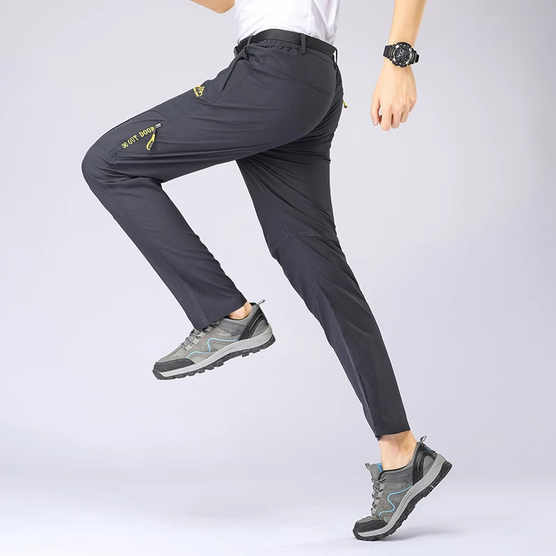 Svabl 5XL pantaloni da trekking estivi ad asciugatura rapida da uomo pantaloni tattici impermeabili elasticizzati tasche con cerniera pantaloni pantaloni da pesca leggeri