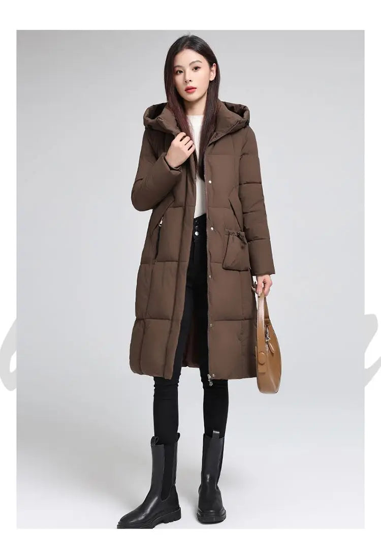 Caldo piumino in cotone da donna Inverno 2025 Nuova versione coreana Cappotto lungo con cappuccio allentato Cappotto Parka spesso antivento femminile
