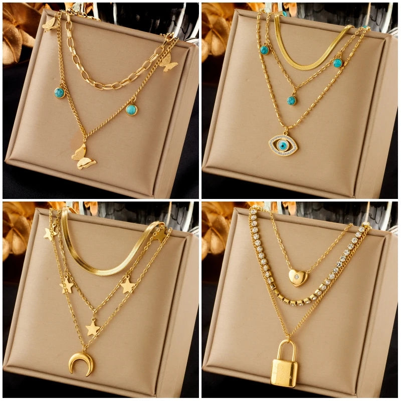 DIEYURO Collana con ciondolo occhi azzurri con serratura a forma di farfalla in acciaio inossidabile 316L per le donne Nuovi regali di gioielli con catena girocollo multistrato
