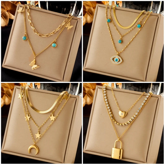 DIEYURO Collana con ciondolo occhi azzurri con serratura a forma di farfalla in acciaio inossidabile 316L per le donne Nuovi regali di gioielli con catena girocollo multistrato