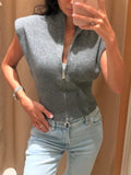 Cardigan in maglia da donna senza maniche con spalline imbottite, collo alto a metà, doppia cerniera, corto, aderente, tinta unita, top di tendenza per la strada