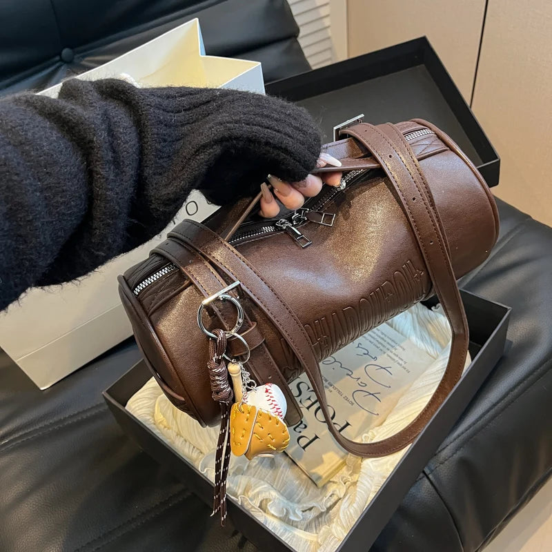 Borse a tracolla multifunzionali a forma di cilindro per donna 2024 Borse invernali di ultime borse firmate Borsa a tracolla di lusso con pendente