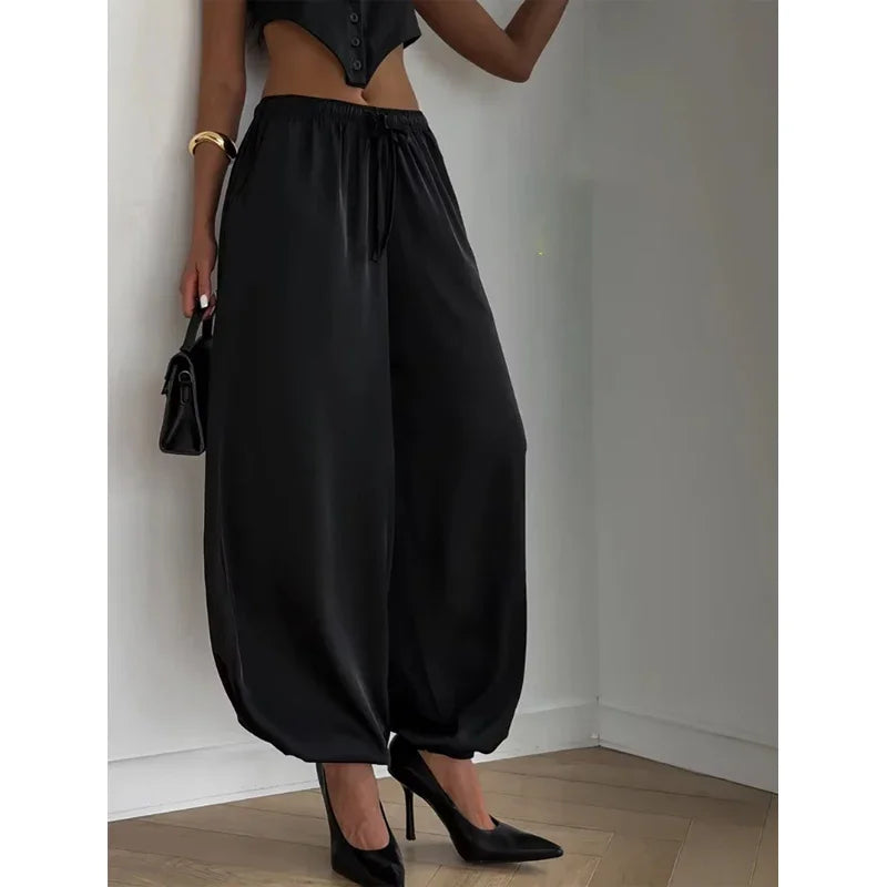 Pantaloni Harem Larghi in Raso Drappeggiato Tinta Unita 2026 con Elastico in Vita e Coulisse, Modellanti, Versatili per Uscite e Pendolarismo, Lunghi Casual