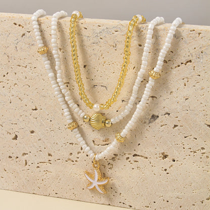 Girocollo impilato con perline fatte a mano bohémien, delicato collana con ciondolo a conchiglia di stelle marine, gioielli da donna per feste estive in spiaggia