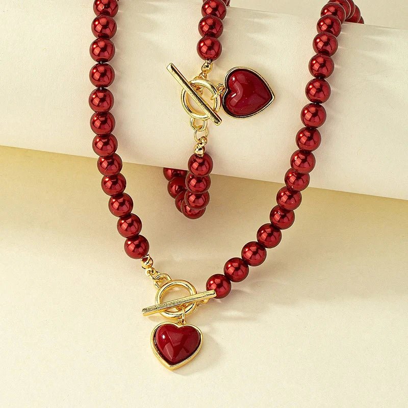 Set di gioielli con bracciale e collana di perle imitazione da 2 pezzi. Elegante collare con perline di colore naturale con ciondolo color perla per ragazza