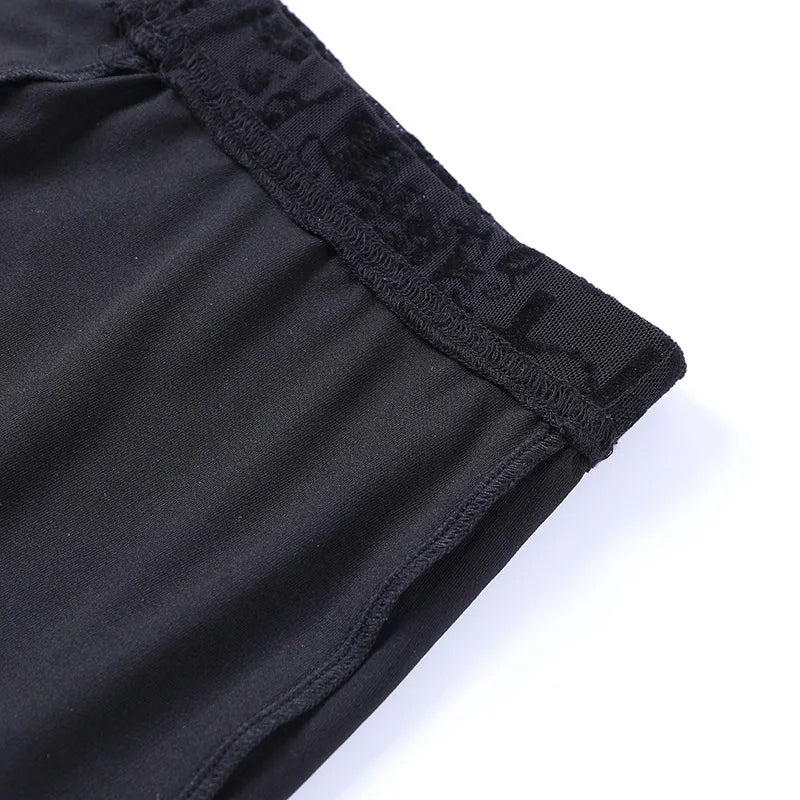 Pantaloni Donna Goth Dark Vintage Floccati Stile Gotico Sexy a Zampa d'Elefante Grunge Trasparenti in Rete a Vita Alta Punk Slim Abbigliamento Alternativo
