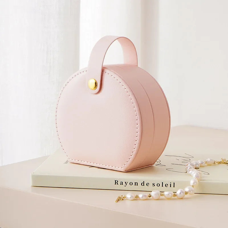 Mini organizzatore di gioielli Display Portagioie da viaggio Scatole Orecchini Collana Anello Borsa portatile Portagioie Portaoggetti in pelle