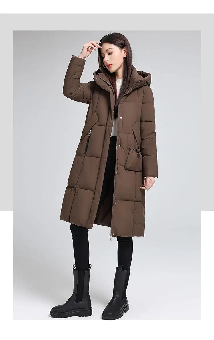Caldo piumino in cotone da donna Inverno 2025 Nuova versione coreana Cappotto lungo con cappuccio allentato Cappotto Parka spesso antivento femminile