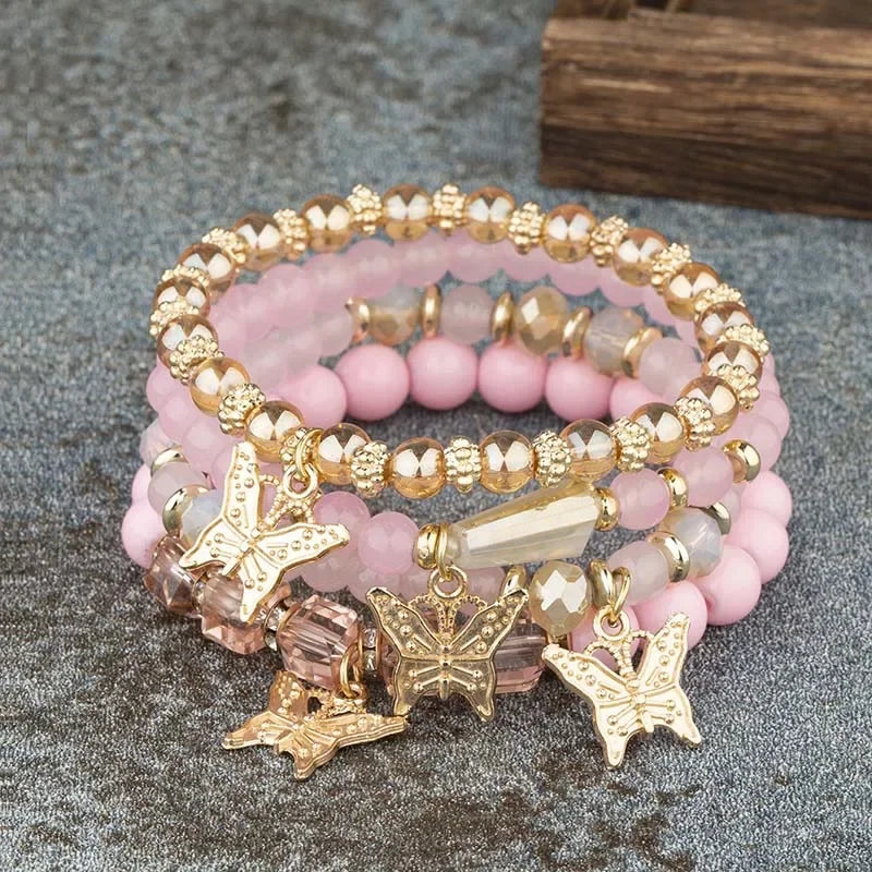 Set di braccialetti con perline a farfalla alla moda da 4 pezzi per le donne, perline acriliche rosa, braccialetto a catena elastica, regalo di gioielli per feste bohémien femminili