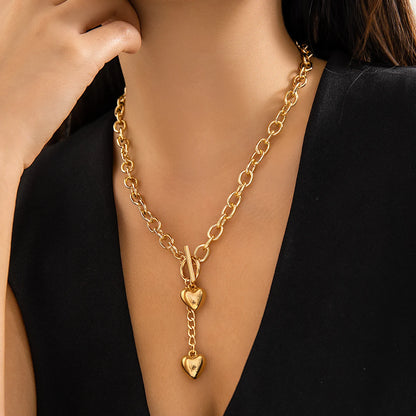 IngeSight.Z Collana a catena lunga con ciondolo a forma di cuore in metallo retrò per donna Collana girocollo con fibbia OT color oro punk