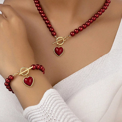 Set di gioielli con bracciale e collana di perle imitazione da 2 pezzi. Elegante collare con perline di colore naturale con ciondolo color perla per ragazza