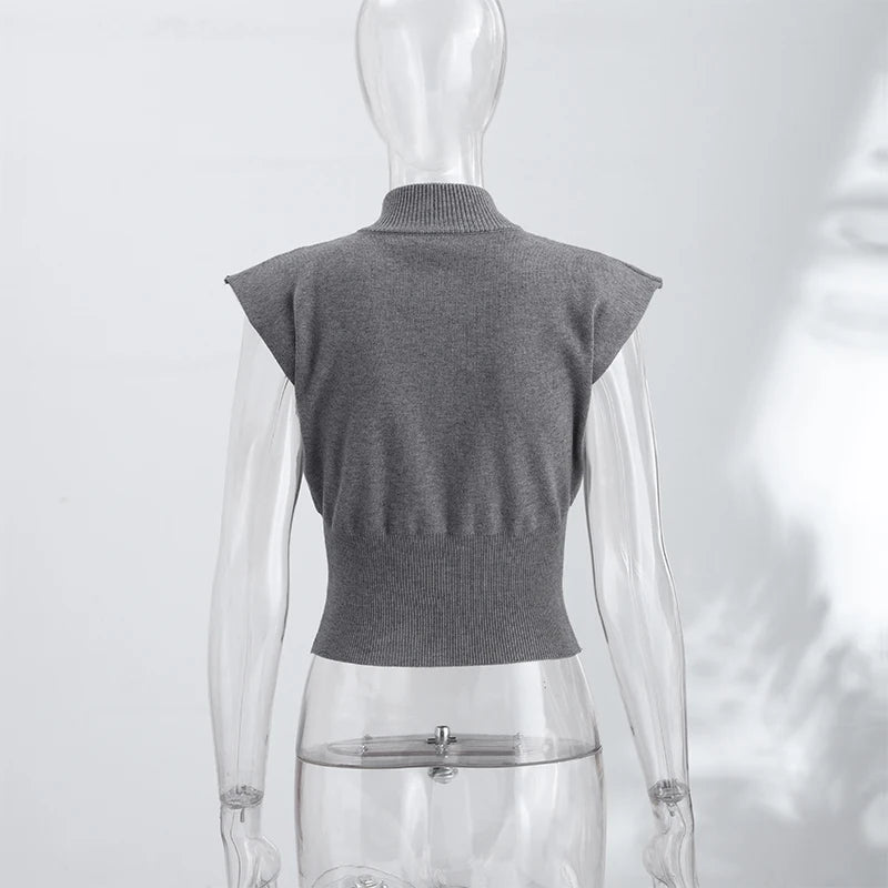Cardigan in maglia da donna senza maniche con spalline imbottite, collo alto a metà, doppia cerniera, corto, aderente, tinta unita, top di tendenza per la strada