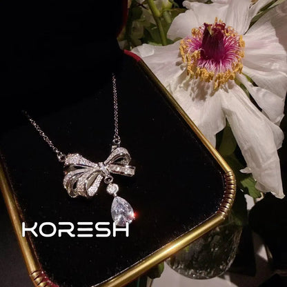 Collier pour femmes avec nœud et diamants, nouvelle parure de boucles d'oreilles pendantes en zircon pour femmes 2025