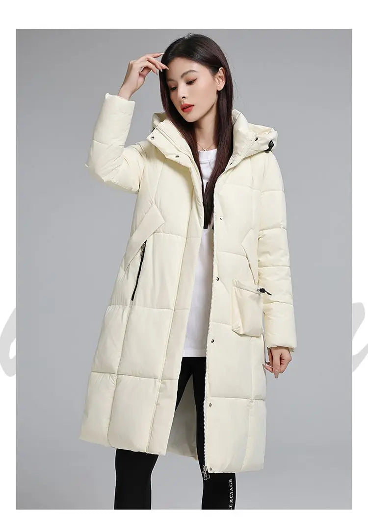 Caldo piumino in cotone da donna Inverno 2025 Nuova versione coreana Cappotto lungo con cappuccio allentato Cappotto Parka spesso antivento femminile