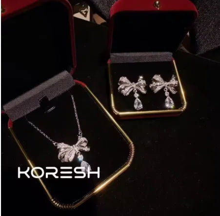 Collier pour femmes avec nœud et diamants, nouvelle parure de boucles d'oreilles pendantes en zircon pour femmes 2025