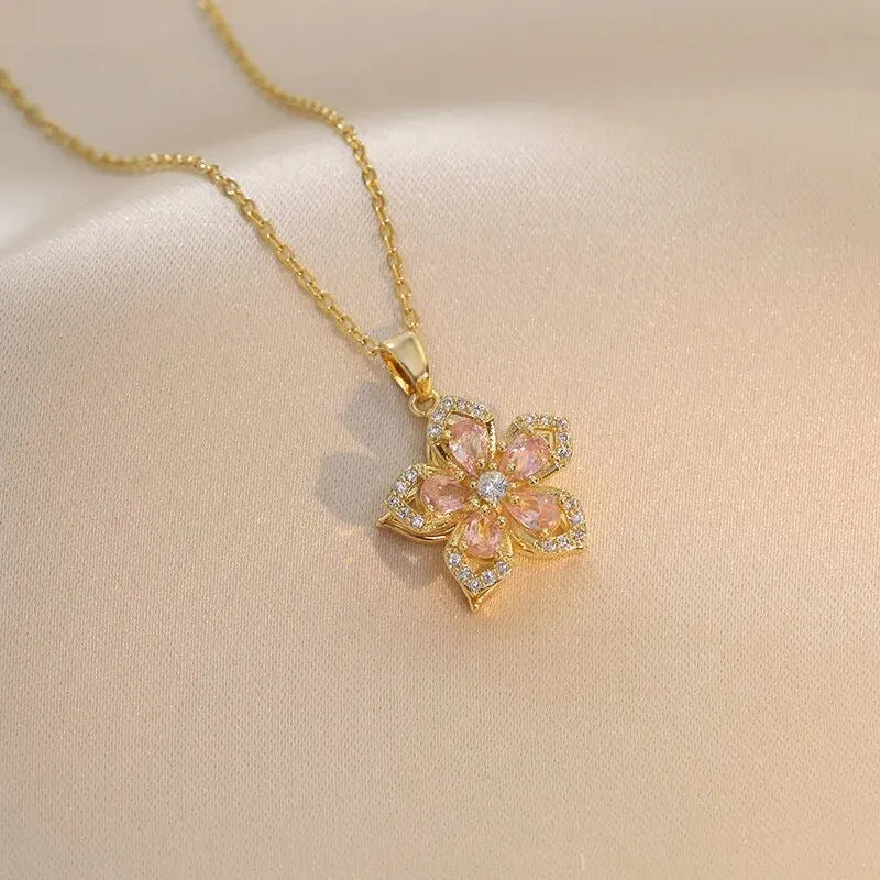 Collana con ciondolo fiore zircone rotante di lusso leggero per le donne Collane a catena ad alto senso di qualità color oro Regali di gioielli per feste