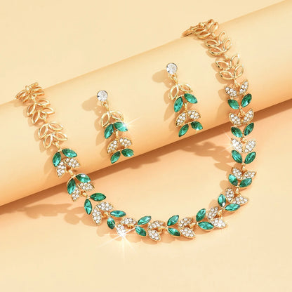 Boucles d'oreilles, colliers, parures de bijoux, mariages, fêtes et cadeaux de vacances en forme de feuilles à la mode pour femmes pour un usage quotidien.