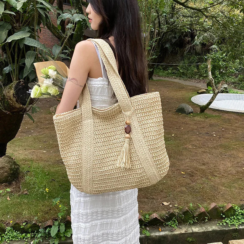 Borsa a tracolla tessuta estiva borsa da spiaggia da donna borsa da viaggio con nappe da viaggio in paglia lavorata a maglia fatta a mano di grande capacità