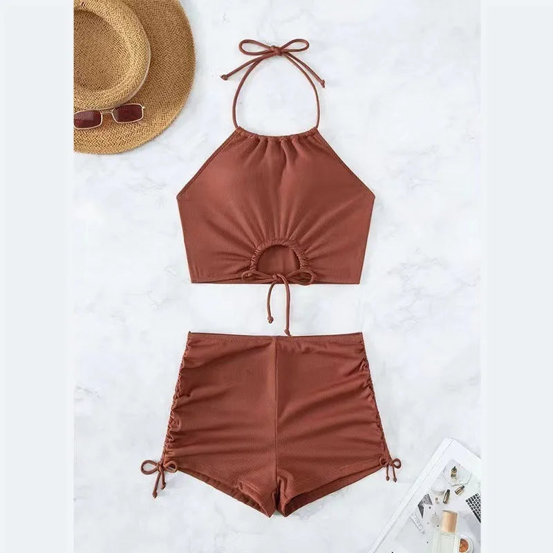 Maillot de bain femme européen et américain couleur unie bretelles bikini cou suspendu maillot de bain fendu sexy style fille épicée cordon de serrage