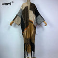 WINYI cappotto invernale per donna stile retrò stampa nappe cappotto lungo di lusso in pelliccia sciolto spesso caldo lungo piumino cardigan moda