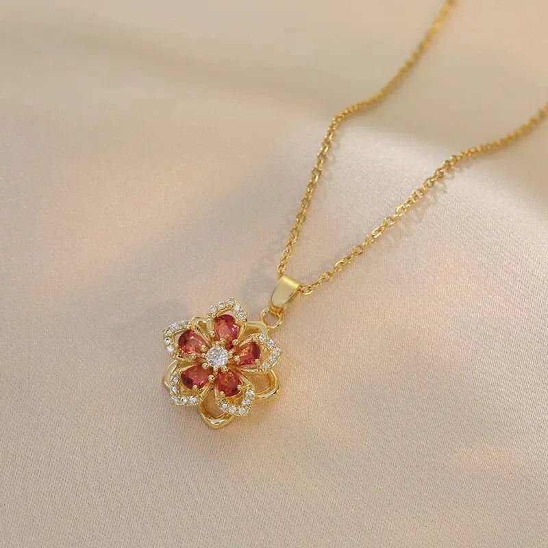 Collana con ciondolo fiore zircone rotante di lusso leggero per le donne Collane a catena ad alto senso di qualità color oro Regali di gioielli per feste