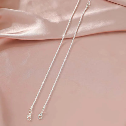 Cavigliera a catena sottile scintillante per donna Bracciale a doppio strato con ciondolo a forma di croce a cuore con zirconi sul piede della gamba Gioielli da spiaggia estivi alla moda