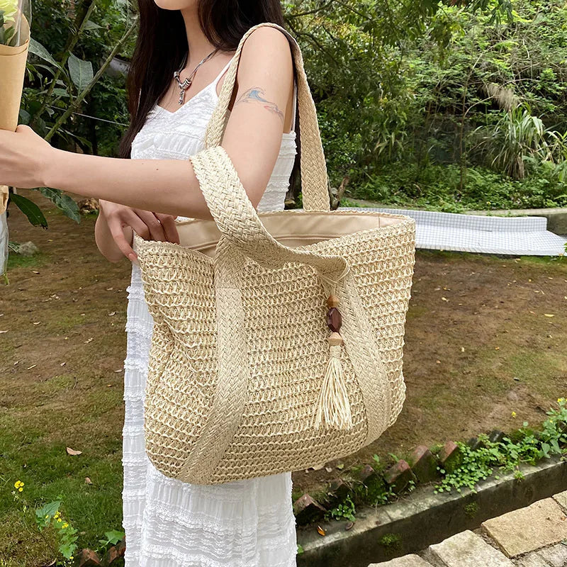 Borsa a tracolla tessuta estiva borsa da spiaggia da donna borsa da viaggio con nappe da viaggio in paglia lavorata a maglia fatta a mano di grande capacità