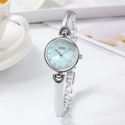 UTHAI W34 Orologio da polso da donna Luce di lusso Semplice squisito quadrante rotondo Orologio impermeabile Lady Fashion Orologi al quarzo coreani