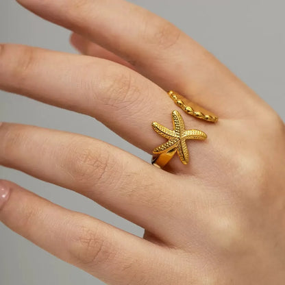 Questo anello di regolazione dell'apertura a bordo largo geometrico di alta qualità e alla moda con oro elettrolitico e design minimalista è Perf