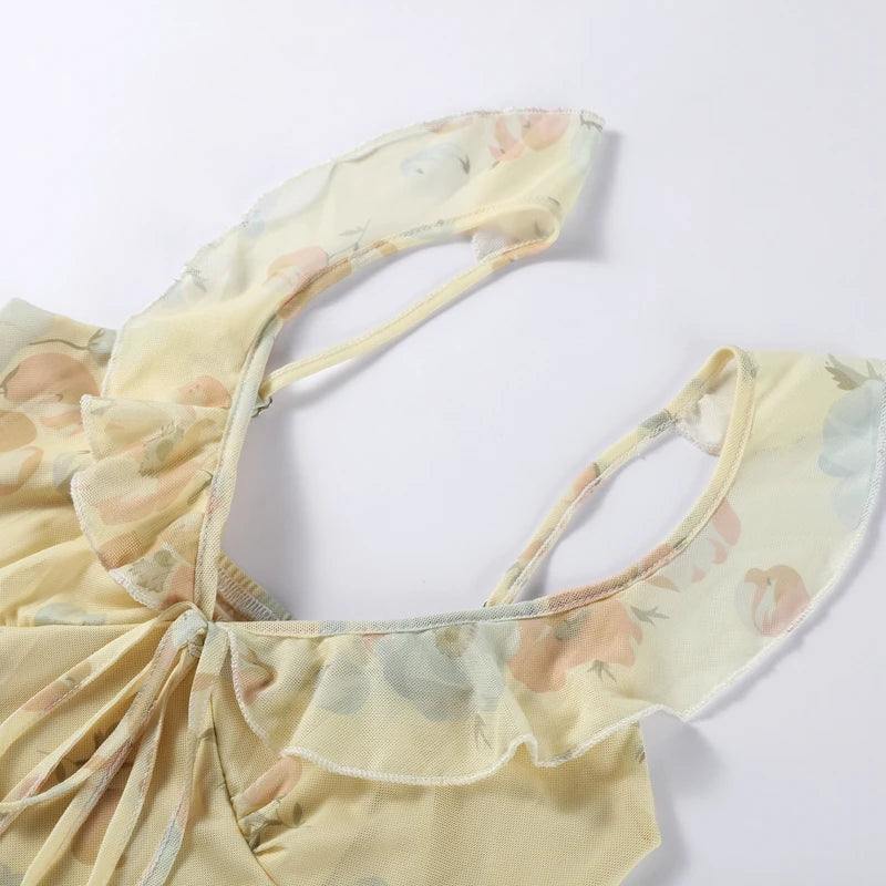 Abito da spiaggia con volant con stampa floreale Abito da donna elegante senza maniche senza schienale scollato con lacci Abiti lunghi 2025 Abito estivo da donna nuova