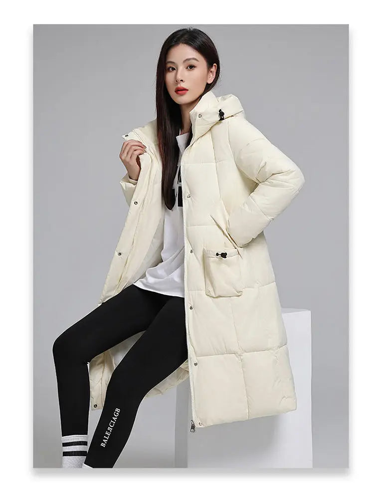 Caldo piumino in cotone da donna Inverno 2025 Nuova versione coreana Cappotto lungo con cappuccio allentato Cappotto Parka spesso antivento femminile