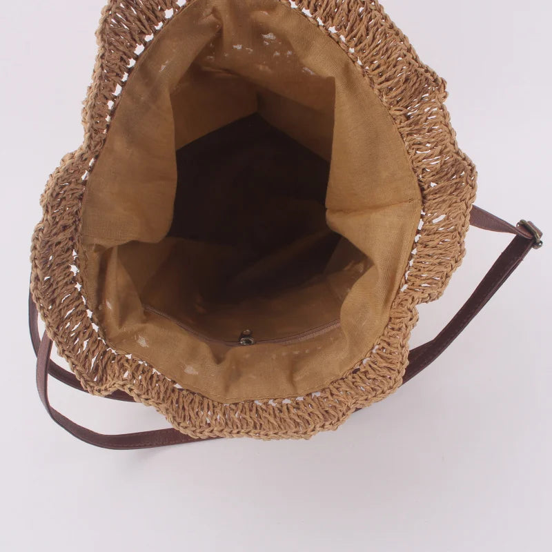 Borsa a tracolla da spiaggia in paglia estiva da donna fatta a mano borsa a tracolla con coulisse cava intrecciata borsa da viaggio con Design femminile di moda lavorata a maglia