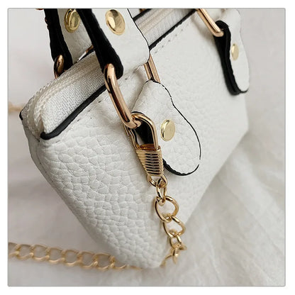 Borsa quadrata piccola da ragazza a tracolla per l'estate 2025, i nuovi bambini classici che portano una borsa a tracolla monospalla. portachiavi portafoglio