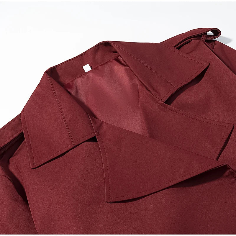 Trench con lacci con risvolto solido per le donne Moda maniche lunghe spalla larga cappotto corto allentato 2025 Nuovo autunno pendolari Outwear